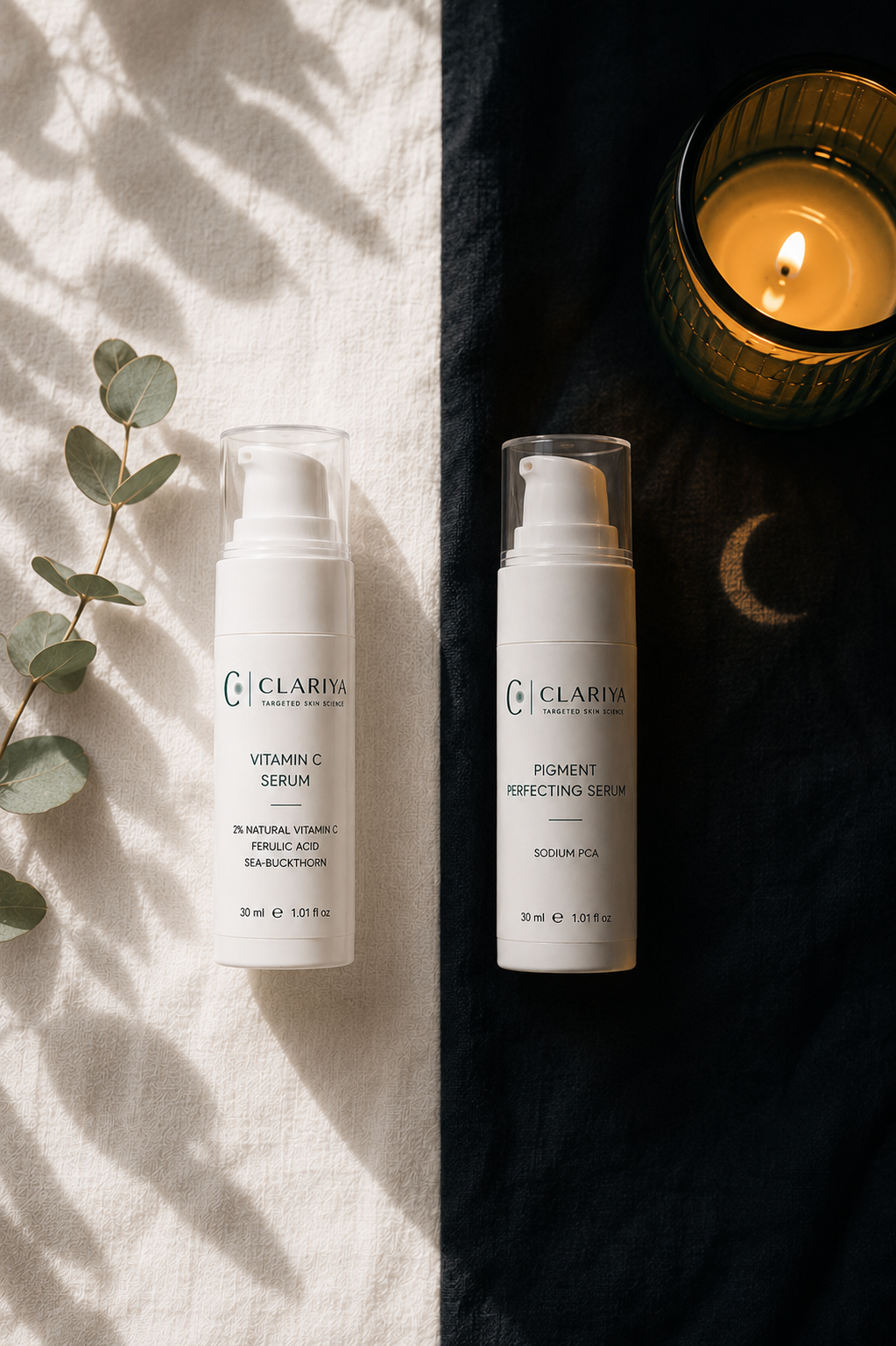 Flat lay of the CLARIYA duo split between morning and evening light, with eucalyptus, a waffle towel and a lit candle in amber glass.
