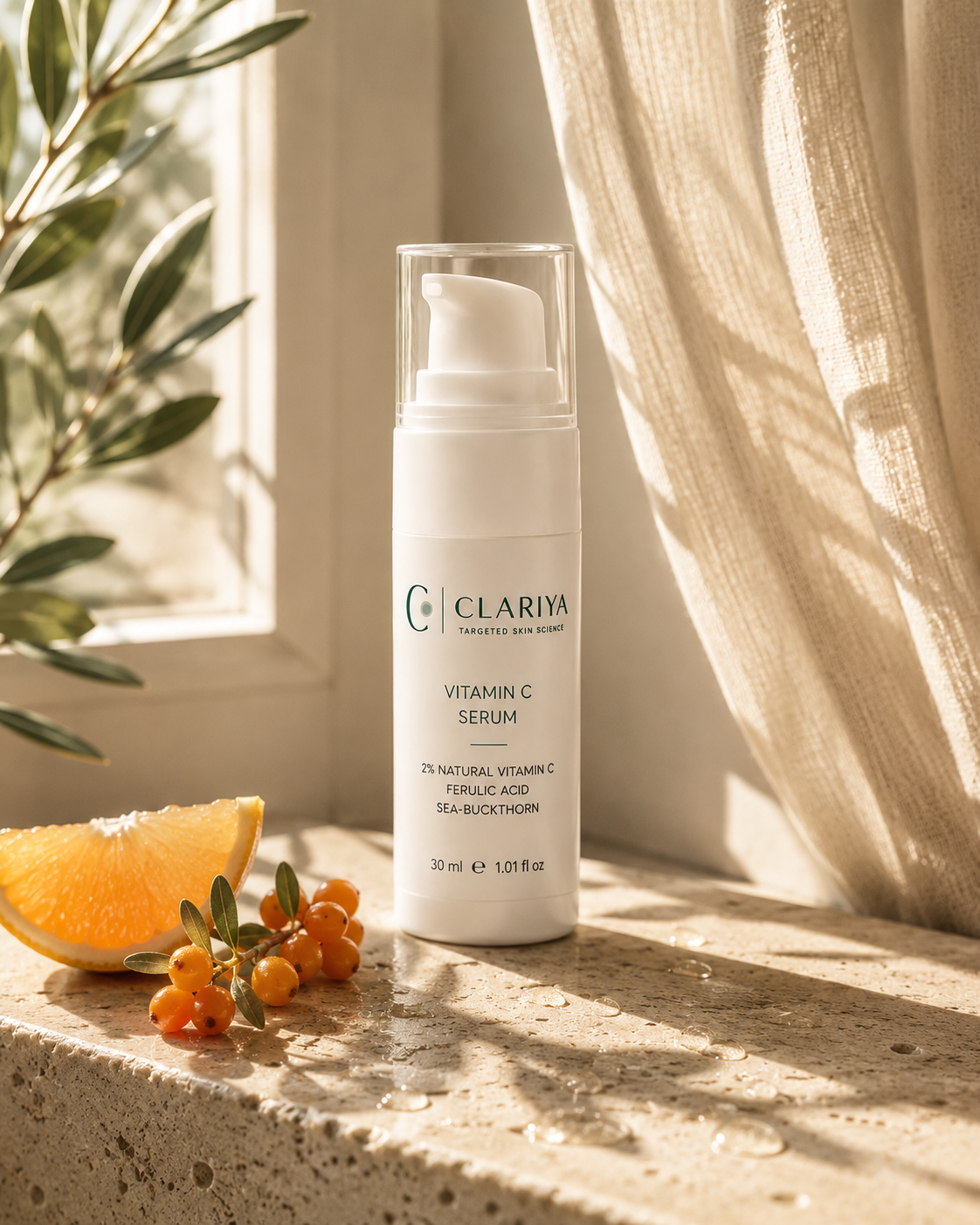 The CLARIYA Vitamin C Serum in golden morning window light with sea-buckthorn berries and an orange slice.